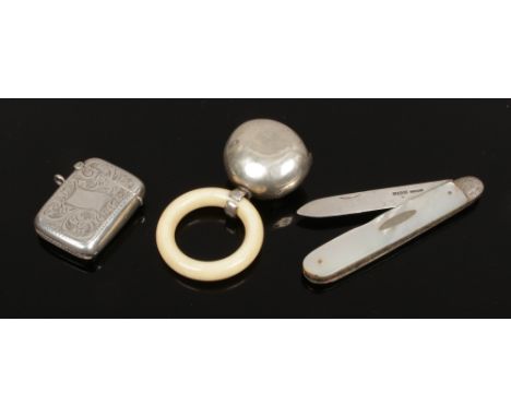 A collection of silver items to include silver and mother of pearl fruit knife, assayed Sheffield 1914, silver vesta case, as