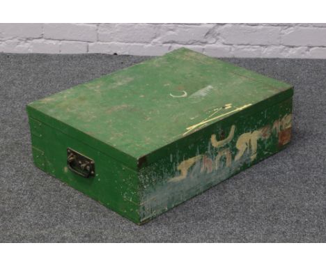 A painted green twin handle wooden trunk with metal top.