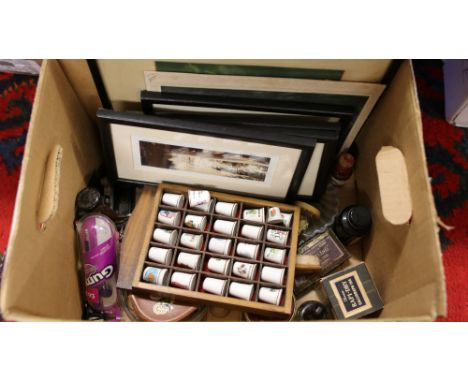 A box of miscellaneous to include framed prints ceramic thimbles with wall hanging display etc.