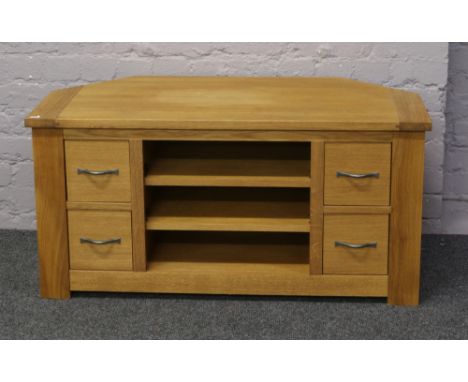 A light oak T.V unit.