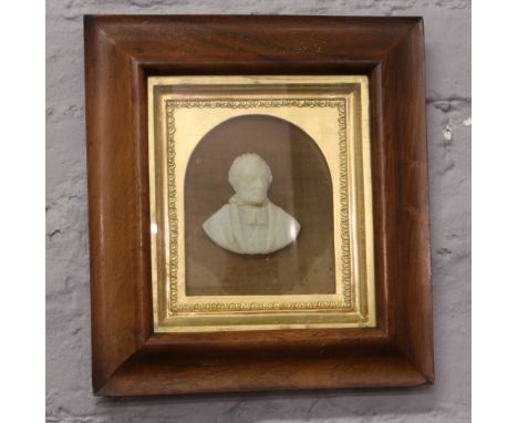 A framed Victorian in relief wax portrait possibly Gladstone.