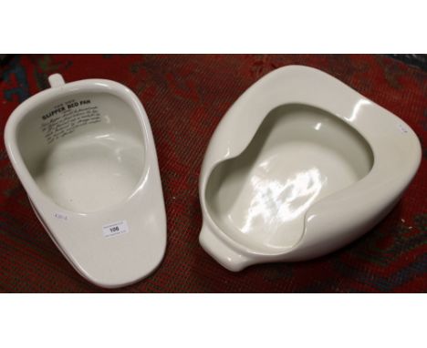 Two ceramic bed pans.