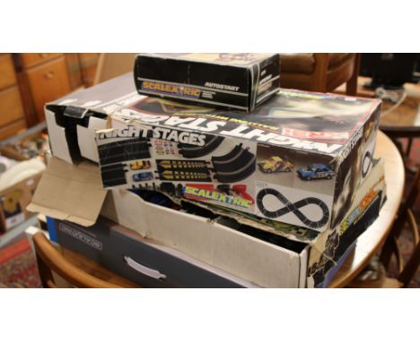 A collection of Scalextric incomplete sets and accessories to include Night Stages and Ultimate Rivals, auto start and banked