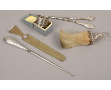 Five pieces of silver and white metal to include silver serviette ring, assayed Birmingham 1907, silver handle button hook, p