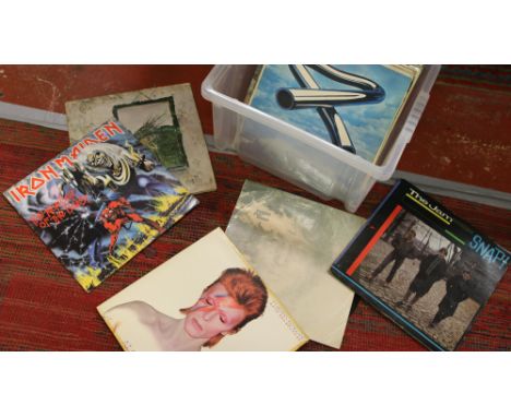 A collection of rock and reggae L.Ps to include Iron Maiden, Jethro Tull, Led Zeppelin, Jimi Hendrix and Bob Marley etc.
