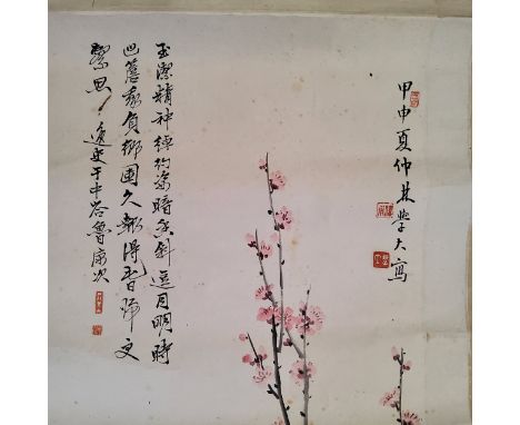 An early 20th century Chinese hanging calligraphy scroll, Qing dynasty,  painted with a bird perched on a cherry blossom abov