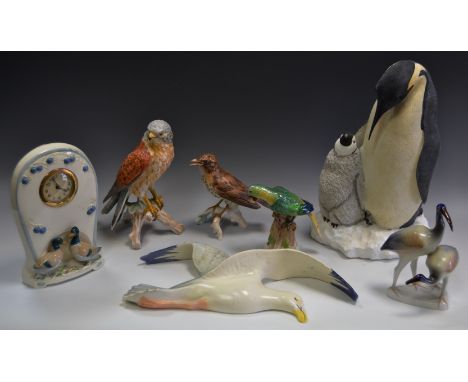 A Country Artists model of a Emperor penguin and chick; a Goebel model of a bird of prey; a Goebel Thrush; a Sylvac seagull; 