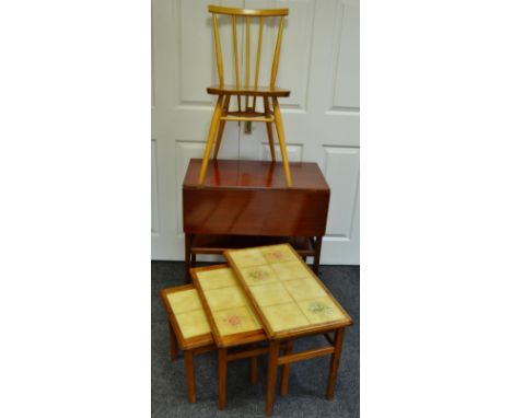 A stained mahogany trolley;  an Ercol kitchen chair, 884923;  a set of Ambercraft tile top tables (3)