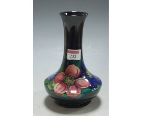 A Moorcroft pottery vase decorated in the Hibiscus pattern (restored) 