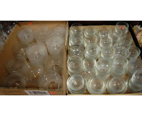 Two boxes of miscellaneous glassware to include various early 20th century finger bowls, each engraved with the monogram 'R'
