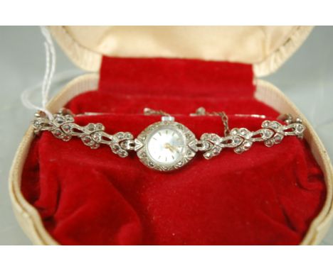 An Avia ladies cased and marcasite set cocktail watch, with manual wind movement, boxed