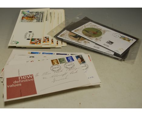 A box of assorted first day covers mainly dating from the 1970s