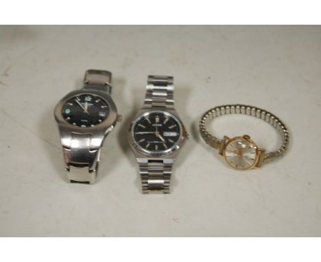 A gents Lorus steel cased quartz wristwatch; one other by Sekonda; and a ladies manual wind wristwatch (3) 