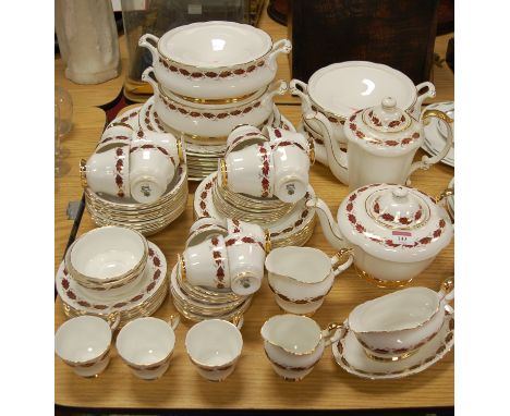 An extensive Paragon tea/dinner service in the Elegance pattern, to include: dinner plates; meat plate; tureens and covers et