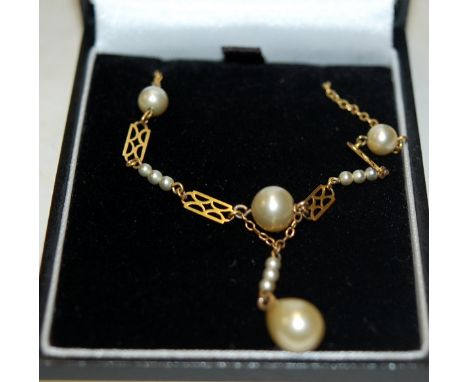 A 9ct gold and pearl set necklet, and a modern 9ct white gold and aquamarine pendant with matching ear studs (2)