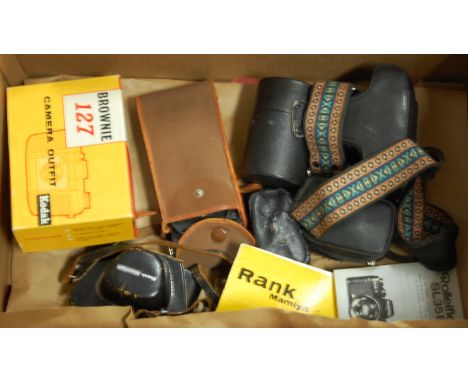 A box of assorted cameras and accessories to include; Kodak Brownie 127 camera outfit