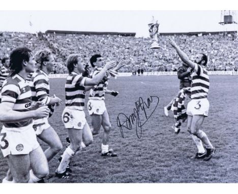 Autographed DANNY McGRAIN 16 x 12 photo - B/W, depicting the Celtic captain throwing the Scottish Cup to teammate Murdo MacLe