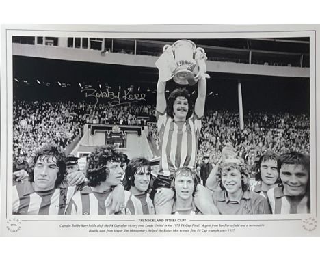 Bobby Kerr signed 16x12 Sunderland 1973 FA Cup black and white print Captain Bobby Kerr holds aloft the FA Cup after victory 