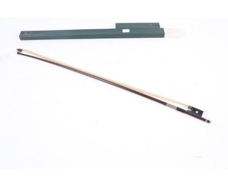 A German bow by Knoll. With octagonal stick, the ebony frog inlaid with mother-of-pearl eyes and the ebony adjuster with two 