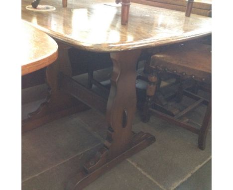 A SMALL ERCOL ELM REFECTORY TABLE   H72CM W108CM D75CM
