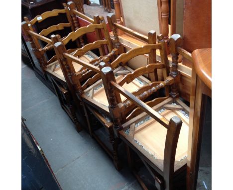 A SET OF 6 LADDER BACK CHAIRS