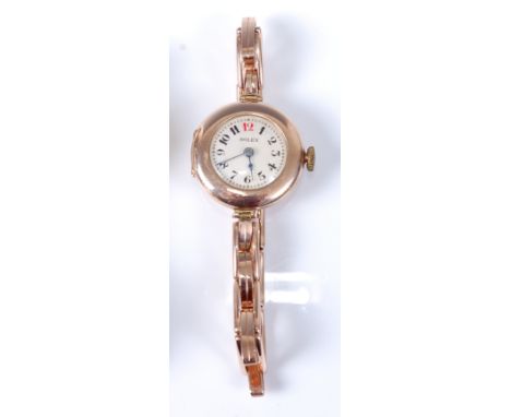 A lady's Rolex 9ct gold cased wristwatch, having a signed white dial with Arabic numerals, manual wind fifteen jewel movement