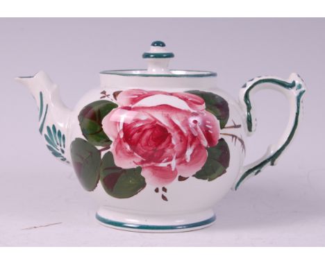 A Wemyss bachelors teapot, decorated with a single cabbage rose, printed backstamp, retailed by T Goode & Co, South Audley St