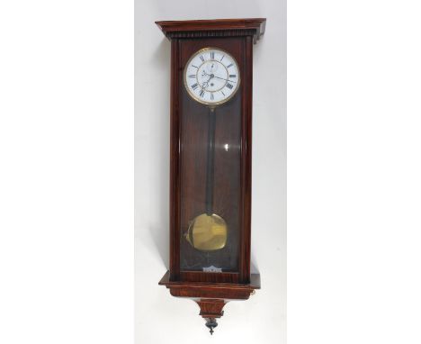 A circa 1900 faux rosewood cased Vienna wall clock, having unsigned white enamel dial (hairlines at 11 o'clock), subsidiary s