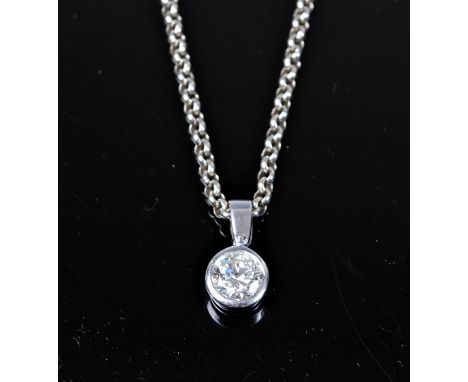 An 18ct solitaire pendant, the round brilliant cut diamond, estimated approx. 0.54cts, in a rubover mount with hanging bale h