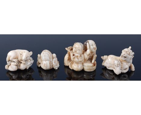 Four various Japanese carved ivory netsukes, comprising; pair of rats, signed, 3.5cm; pair of buskers, penwork decorated and 