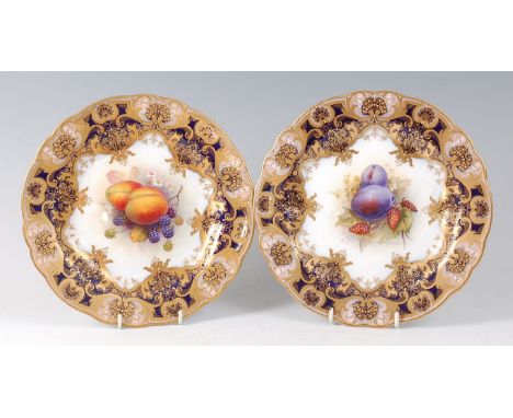 A pair of Royal Worcester porcelain cabinet plates, painted by Richard Seabright, signed, with ripe damsons and raspberries a