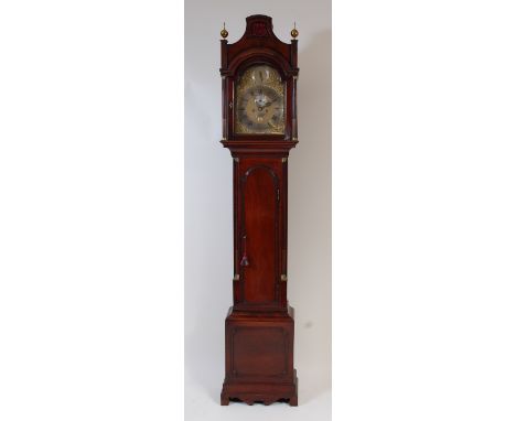 John Brassett of Smithfield (London) - a George III mahogany longcase clock, having an arched brass dial (w.12"), with strike