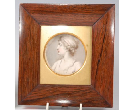 19th century English school - profile bust portrait of a girl, miniature watercolour on ivory, framed as a circle, 7.5cm, in 