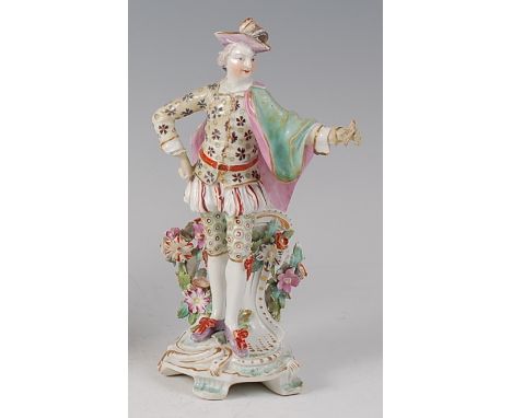 An 18th century Derby figure 'The Letter', modelled as a gallant holding a love letter in his left hand, the whole decorated 