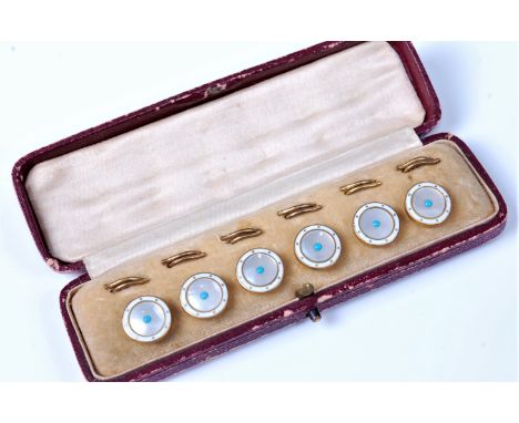 A set of six enamel buttons, each button approx. 12.5mm diameter, of white enamel and yellow metal, set with a fauxuoise turq
