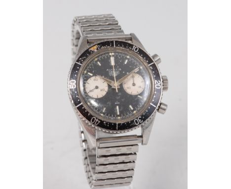 An extremely rare gentlemans stainless steel Heuer Autavia chronograph bracelet watch, circa 1960s, having black dial with tw