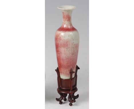 A Chinese Kangxi period red flambé glazed miniature vase, of shouldered tapering form, having green spotted detail, with part