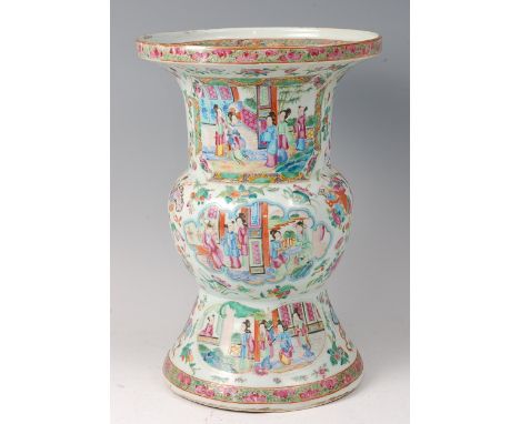 A 19th century Chinese Canton famille rose Gu vase, decorated in bright enamels with reserves of ceremonial figure scenes, th