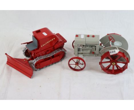 Two Tractor Models to include metal kit built of high standard plowing tractor in red and grey approx. 25cm x 16cm and Calfdo
