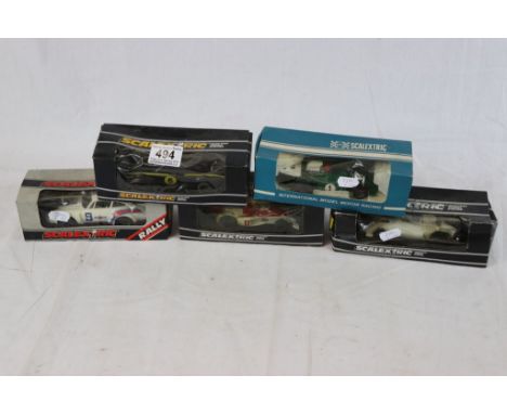 Five boxed Scalextric slot cars to include C051 BRM P160, C052 Ford Escort Mexico Special Build, C127 Marlboro McLaren M23, c