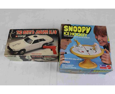 Boxed Corgi The Saint's Jaguar XJS along with a boxed Snoopy Ice Hockey game