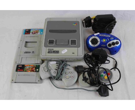 Super Nintendo SNES Console, controller, Donkey Kong Country cartridge, Super Mario Kart cartridge and Super Game Boy cartrid