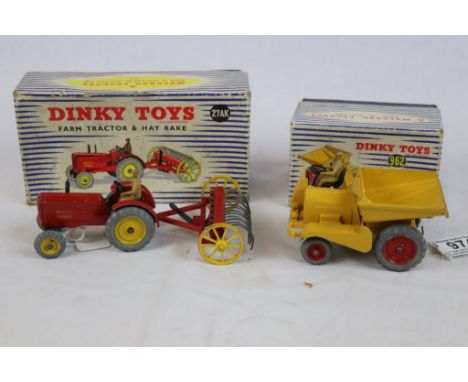 Two boxed Dinky Supertoys to include 27AK Farm Tractor &amp; Hay Rake and 962 Dumper Truck both in a good play worn condition