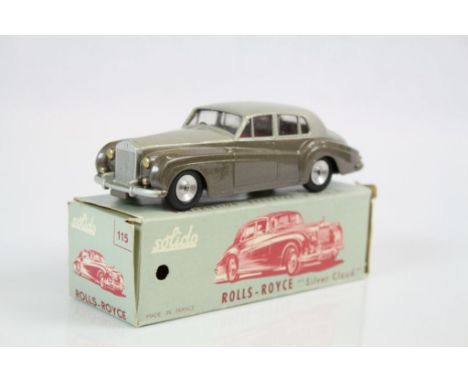 Boxed Solido Rolls Royce Silver Cloud in two tone colour with red interior, vg with a faint scratch to roof, box gd overall