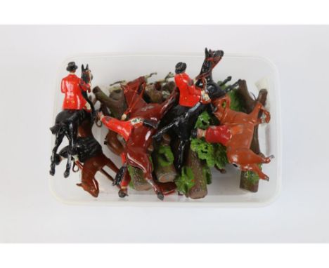 Collection of mainly Britains lead figures, hunting connection, to include 7 riders, 10 hounds, fox &amp; 5 trees