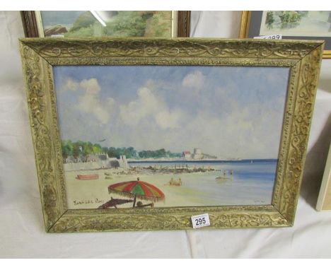A oil on board beach scene entitled Juan Lee Pins and initialled V M W, image 44 x 30cm, frame 54 x40