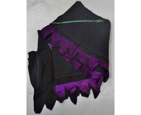 Possibly of suffragette interest, an early 20th century ladies black silk scarf or hem, with purple tassels and green and whi
