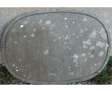 A delabole slate country house oval dairy table top, 120 x 84cm. 