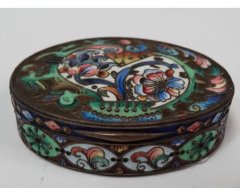 An Imperial Russian silver gilt and cloisonne enamel oval hinge lidded snuff box, foliate decorated, 84 Zolotnik mark and wit