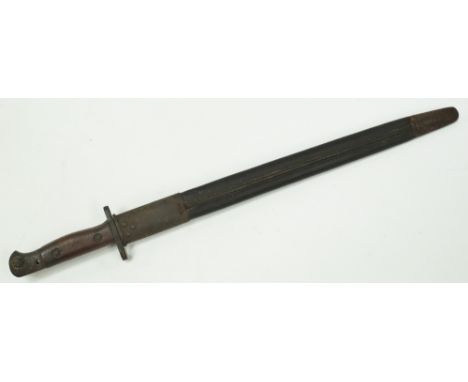 A British 1907 pattern bayonet and scabbard by Wilkinson, length overall 57cm. 